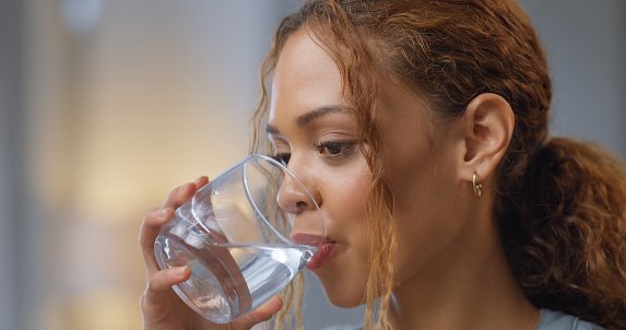 woman drinking cold water